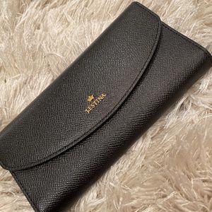 J Estina Wallet